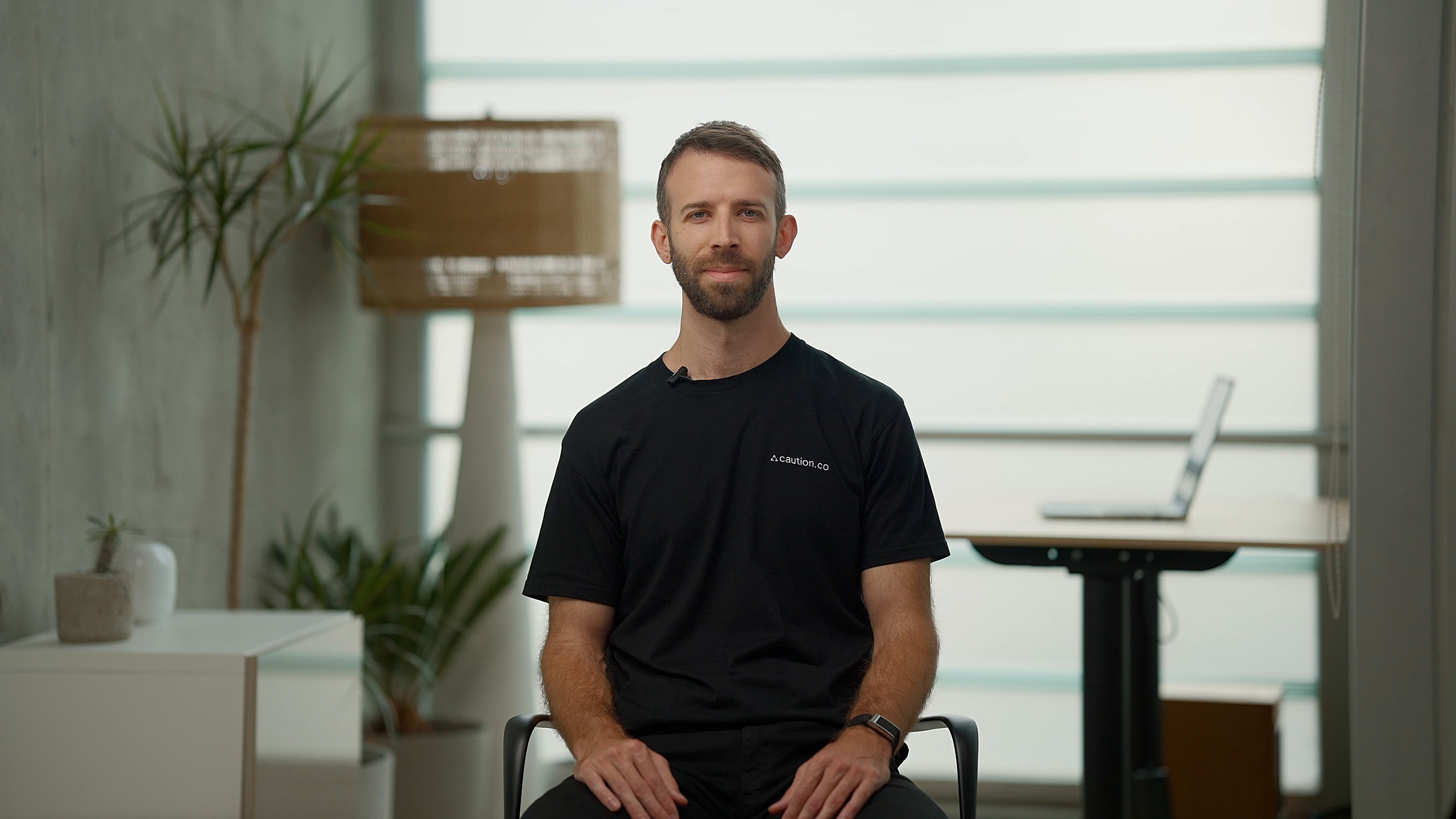 Caution CEO Anton Livaja, wide frontal shot of the interview set, filmed by FogLine Visuals in its SoMa studio, San Francisco