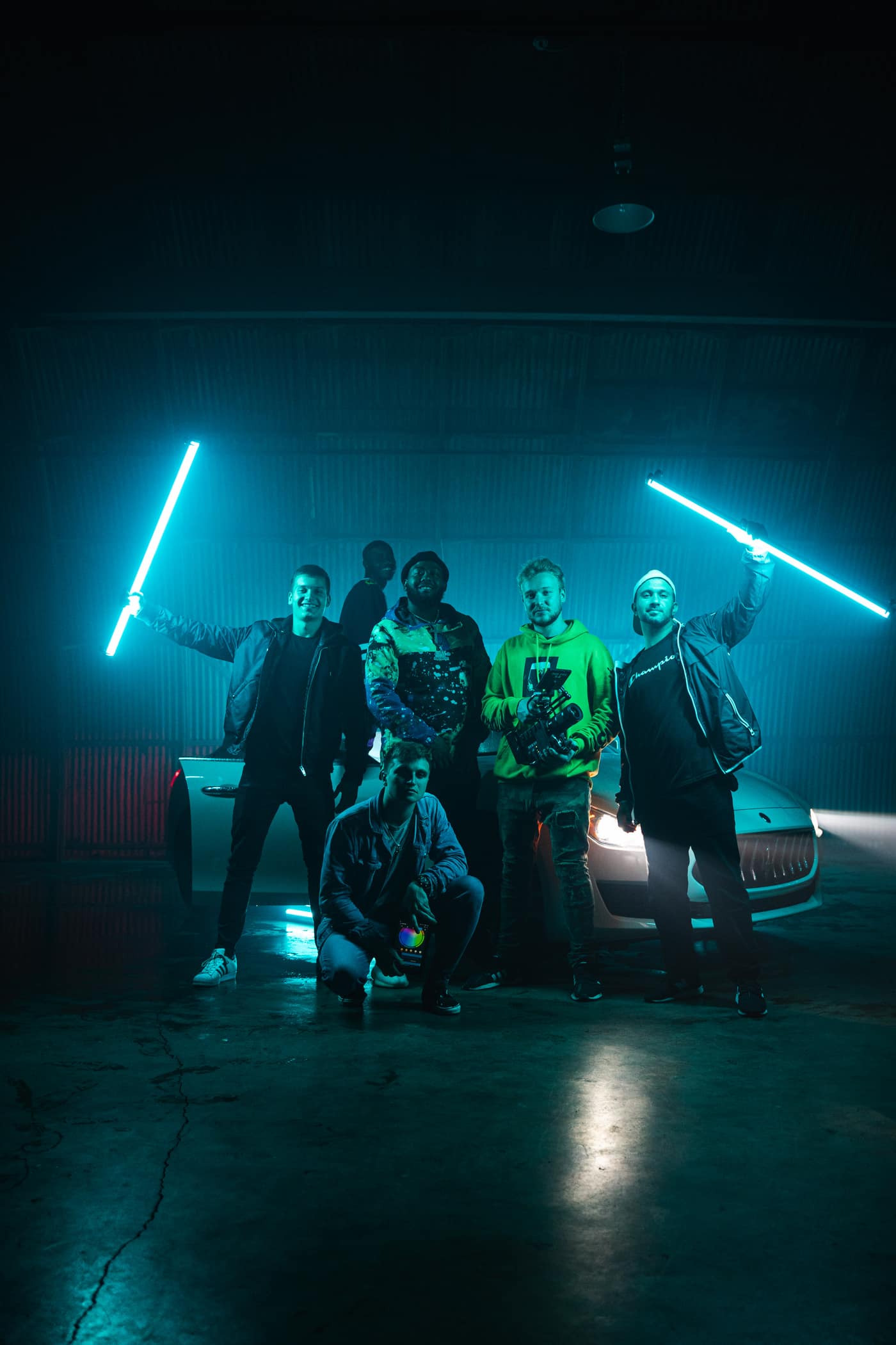 FogLine crew with cinema gear under neon lighting on location
