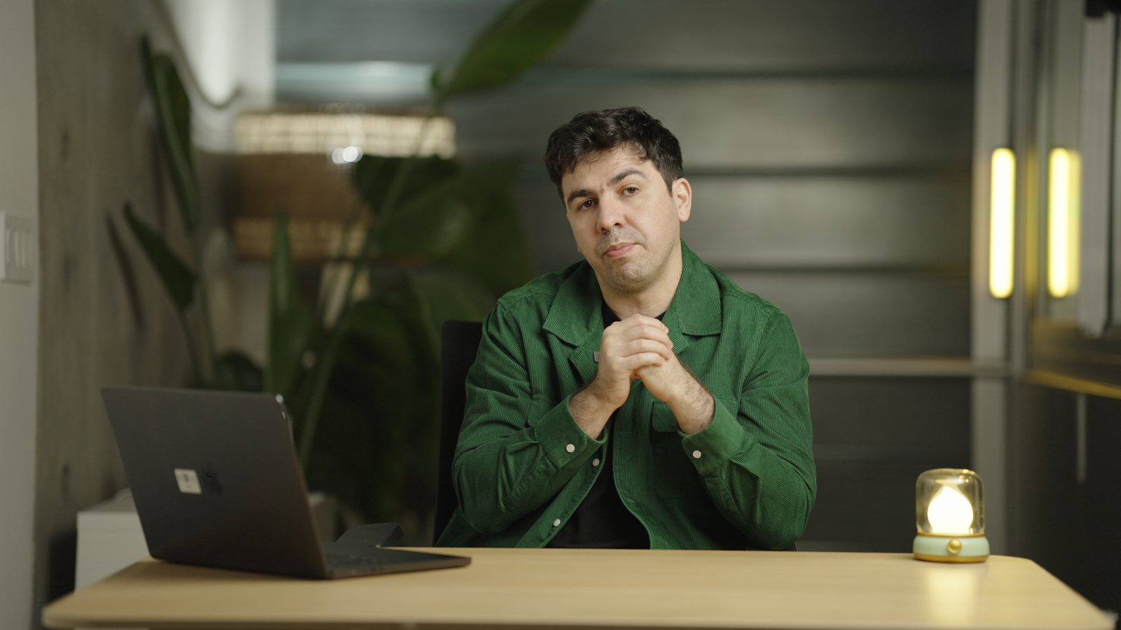 Artin Bogdanov, CEO of SUN, evening desk with practical lights, filmed by FogLine Visuals at its SoMa studio in San Francisco