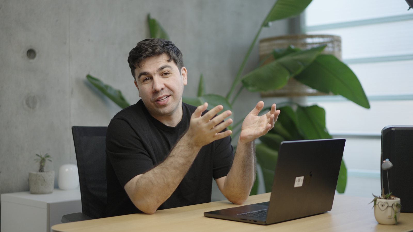 Artin Bogdanov, CEO of SUN, desk talk with a laptop, filmed by FogLine Visuals at its SoMa studio in San Francisco