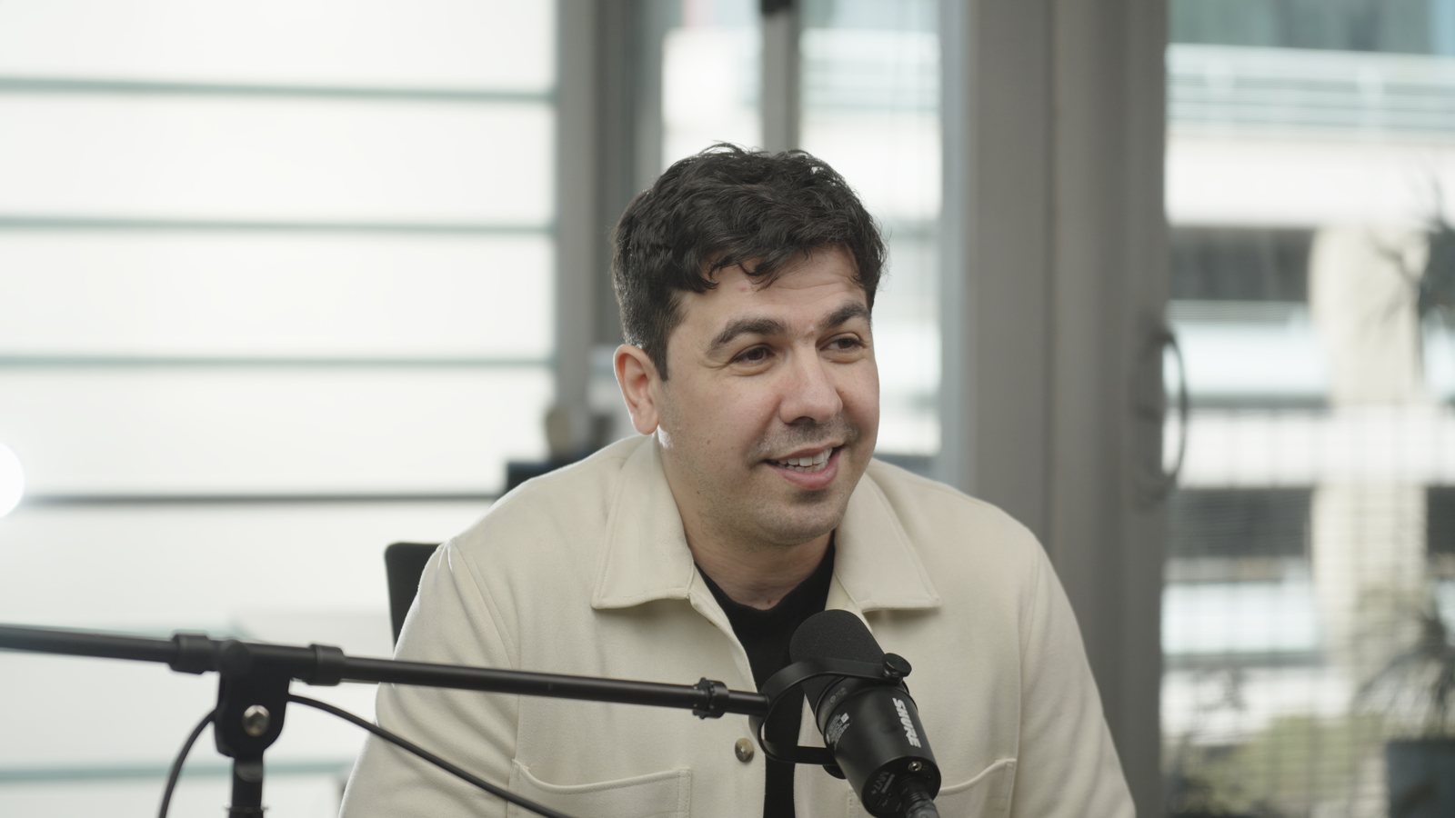 Artin Bogdanov, CEO of SUN, podcast close-up, filmed by FogLine Visuals at its SoMa studio in San Francisco